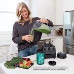 women pouring a green smoothie 